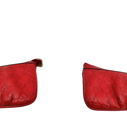 Angoli, Pochette Gucci in pelle rossa con trama Guccissima, da poratre a mano. Originale, usata, di lusso, in ottime condizioni.