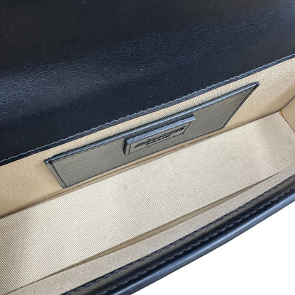 interni  Borsa Jacquemus Le Long Bambino in pelle nera con hardware dorato 