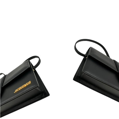 angoli  Borsa Jacquemus Le Long Bambino in pelle nera con hardware dorato 