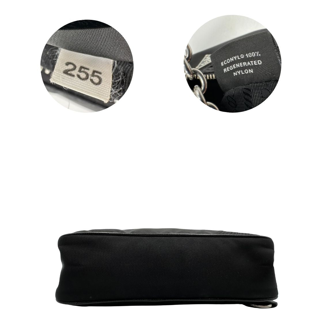 base Borsa Prada in re-nylon nero con finiture in pelle saffiano tono su tono; indossabile a spalla, a tracolla a mano