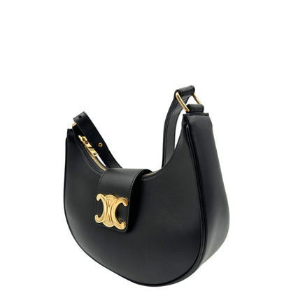 lato Borsa Celine Ava Triomphe nella misura media, dalla silhouette a mezza luna, caratterizzata da una firma Triomphe iconica espressione della renaissance Celine, di lusso, originale, eccellenti condizioni