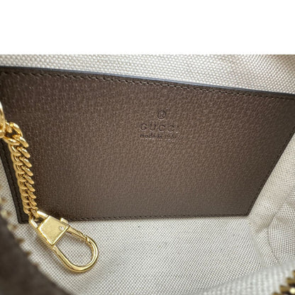 Interno, Borsa Gucci in canvas GG Supreme con l'iconica striscia Web verde e rossa, munita di un manico singolo e una tracolla regolabile e amovibile. Originale, usata, di lussi, in condizioni eccellenti.