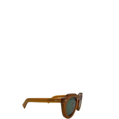 Occhiali da sole Lesca dal carattere rétro, con montatura spessa e arrotondata in acetato color caramello. Originale, usati, di lusso, on ottime condizioni.