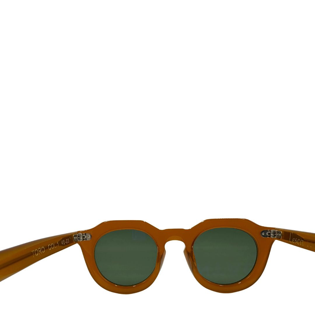 Occhiali da sole Lesca dal carattere rétro, con montatura spessa e arrotondata in acetato color caramello. Originale, usati, di lusso, on ottime condizioni.