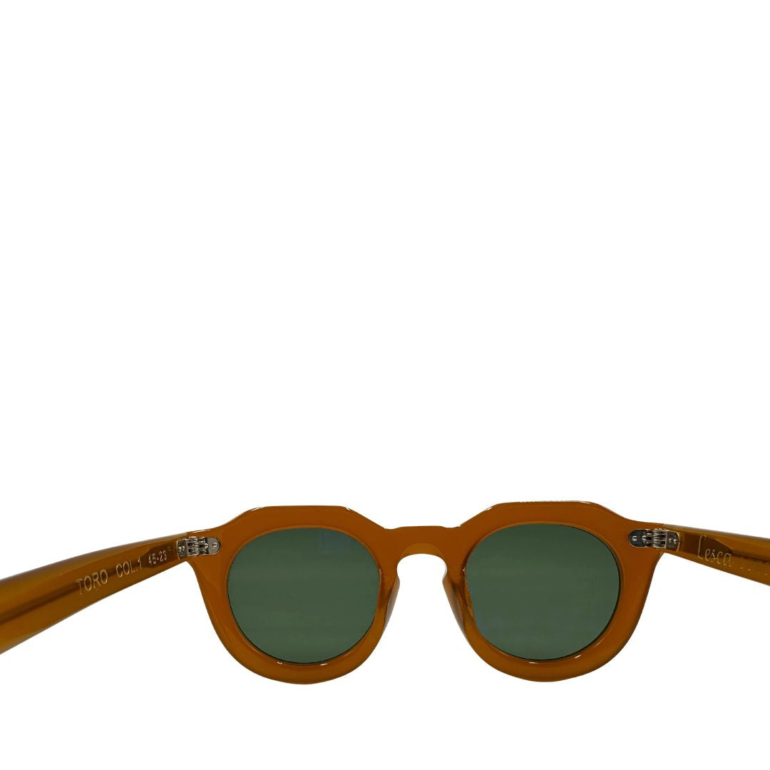 Occhiali da sole Lesca dal carattere rétro, con montatura spessa e arrotondata in acetato color caramello. Originale, usati, di lusso, on ottime condizioni.