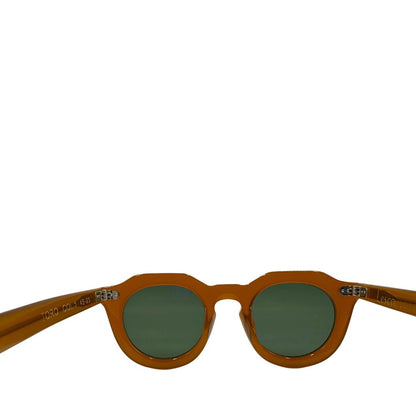 Occhiali da sole Lesca dal carattere rétro, con montatura spessa e arrotondata in acetato color caramello. Originale, usati, di lusso, on ottime condizioni.