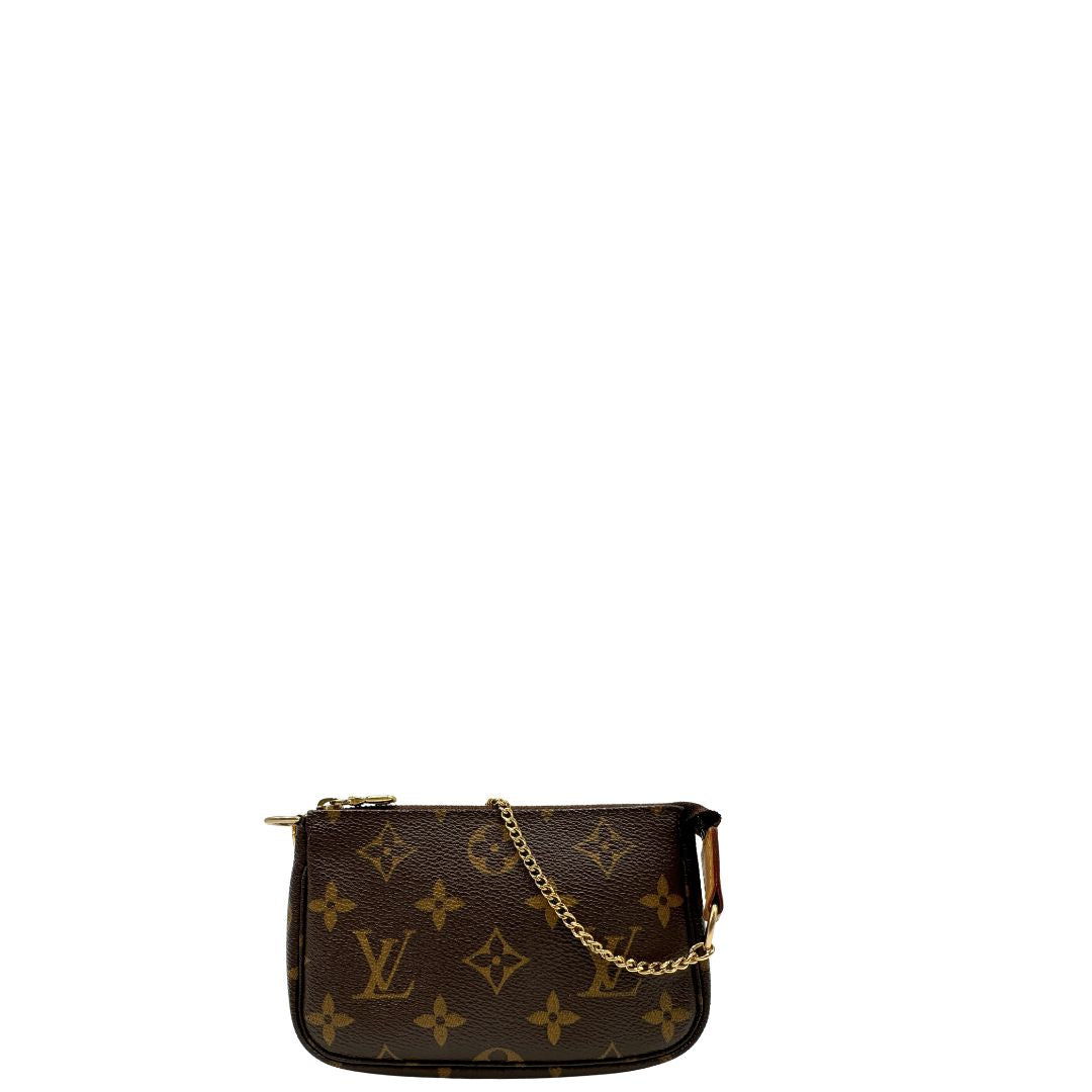 front Pochette Accessoires mini in canvas marrone monogram, da portare a mano.
