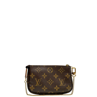 retro Pochette Accessoires mini in canvas marrone monogram, da portare a mano.