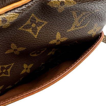 internoBorsa Louis Vuitton in canvas marrone monogram, munita di una tracolla regolabile 