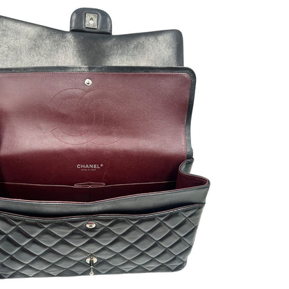 interno Borsa Chanel linea Timeless, in pelle nera trapuntata con motivo matelassé, di lusso, originale, ottime condizioni, usata 