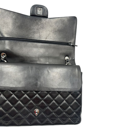 interno Borsa Chanel linea Timeless, in pelle nera trapuntata con motivo matelassé, di lusso, originale, ottime condizioni, usata 