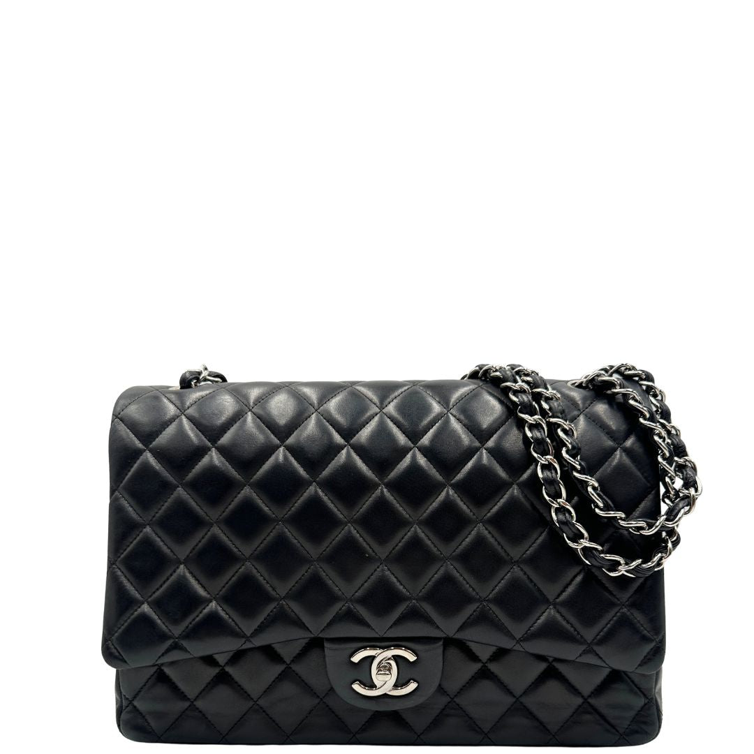front Borsa Chanel linea Timeless, in pelle nera trapuntata con motivo matelassé, di lusso, originale, ottime condizioni, usata 