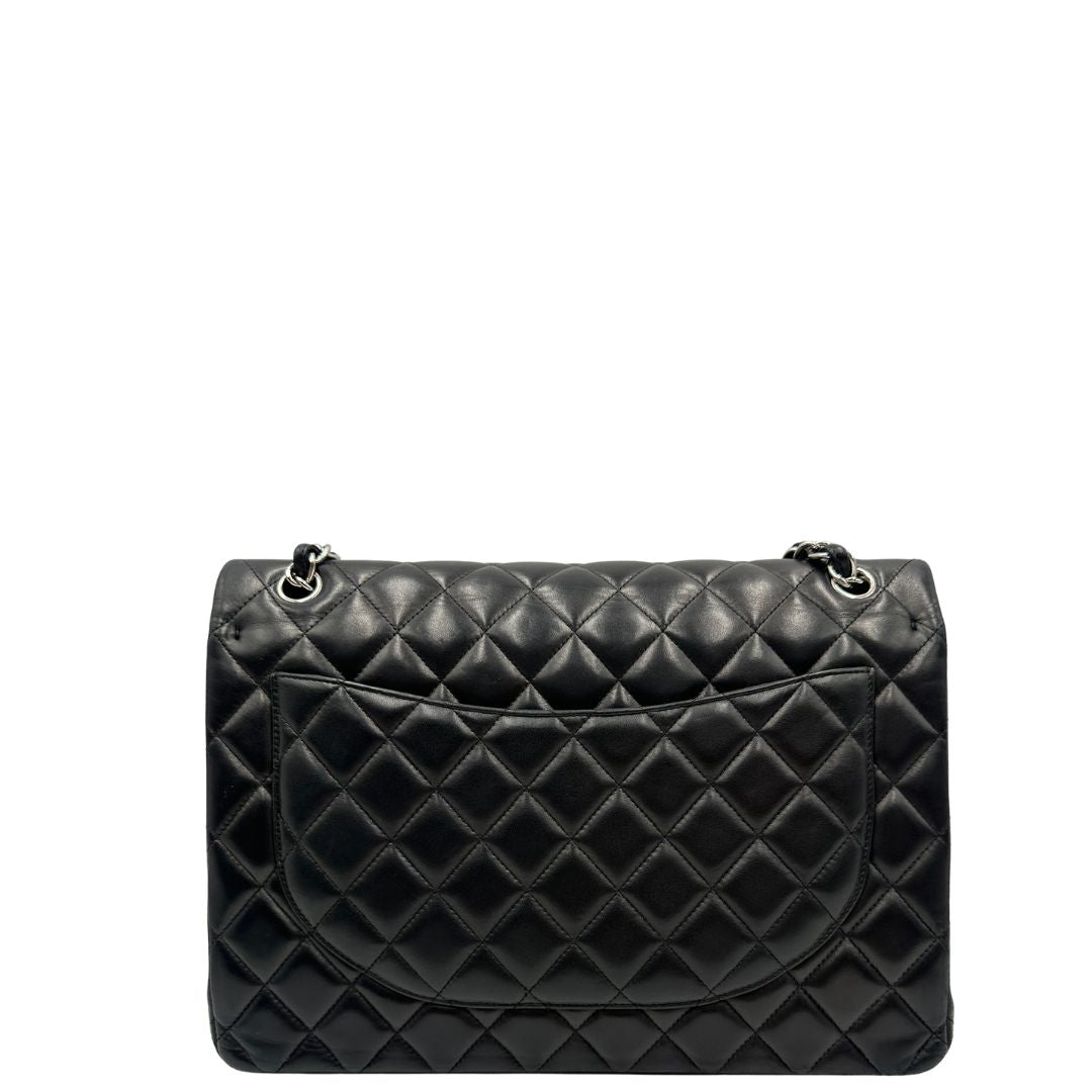 retro Borsa Chanel linea Timeless, in pelle nera trapuntata con motivo matelassé, di lusso, originale, ottime condizioni, usata 