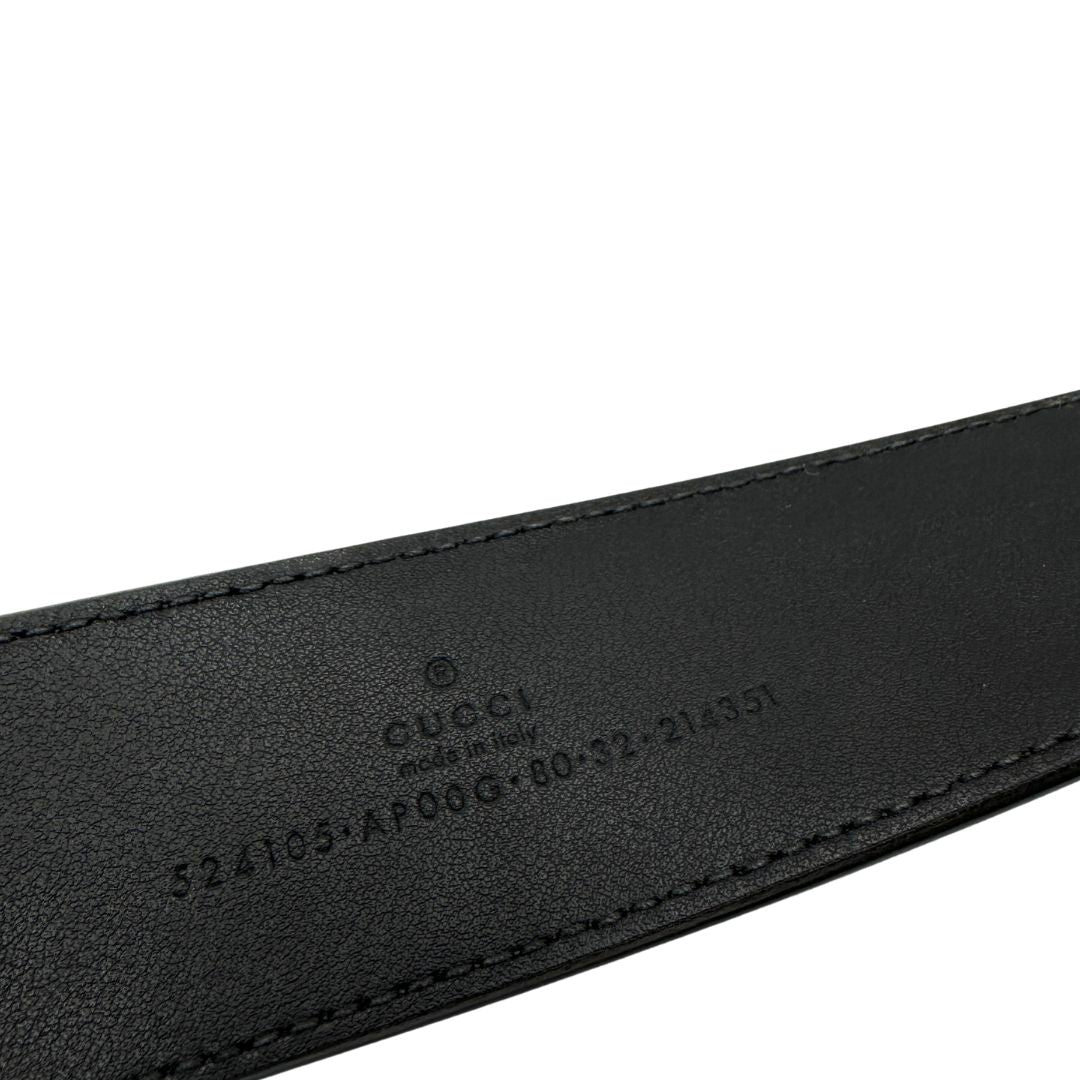 Cintura Gucci in pelle nera con logo GG in metallo dorato. Originale, usata, di lusso, in ottime condizioni.