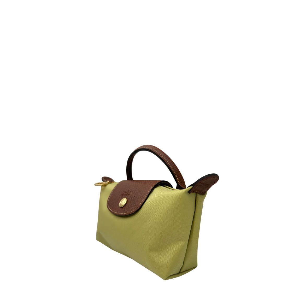 lato Borsa Longchamp Le Pliage in tela color verde pistacchio , di lusso, originale, eccellenti condizioni, usata 
 