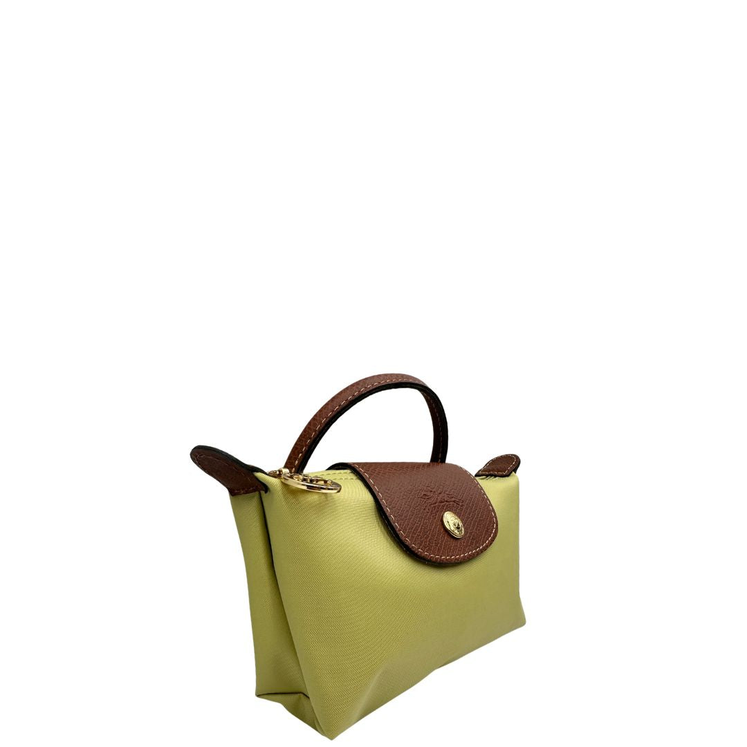 lato Borsa Longchamp Le Pliage in tela color verde pistacchio , di lusso, originale, eccellenti condizioni, usata 
 