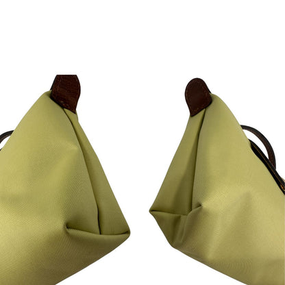 angoli Borsa Longchamp Le Pliage in tela color verde pistacchio , di lusso, originale, eccellenti condizioni, usata 
 