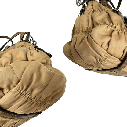 angoli  Borsa Prada in nylon gaufre color cammello  