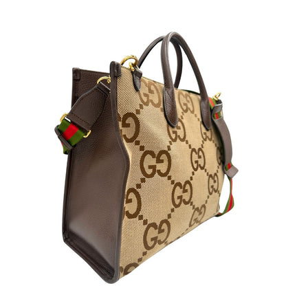 lato Borsa Gucci in tessuto beige caraterrizata dalle doppie G Jumbo, di lusso, originale, ottime condizioni, usata 