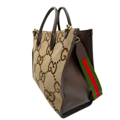 lato Borsa Gucci in tessuto beige caraterrizata dalle doppie G Jumbo, di lusso, originale, ottime condizioni, usata 