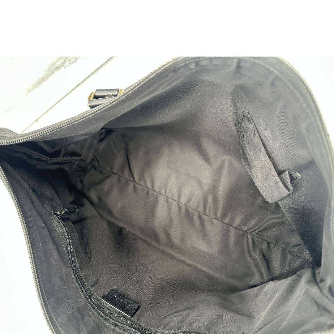 interno Borsa Gucci in tessuto GG nero, di lusso, originale, ottime condizioni, usata 