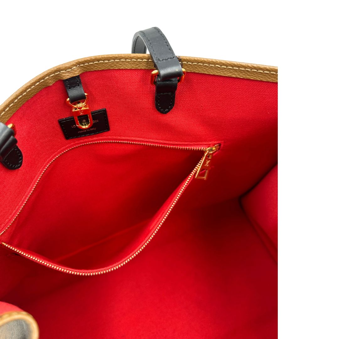 Interno tasca, Borsa LV OnTheGo nella versione GM in canvas marrone monogram Giant e monogram Reverse. Originale, usata, di lusso, in ottime condizioni.