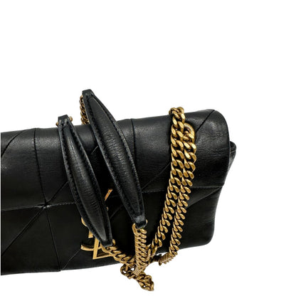 Manici, Borsa Saint Laurent in morbida nappa nera, caratterizzata dall'iconico monogramma YSL dorato e da un'impuntura geometrica trapuntata. Da indossare a spalla o a tracolla.