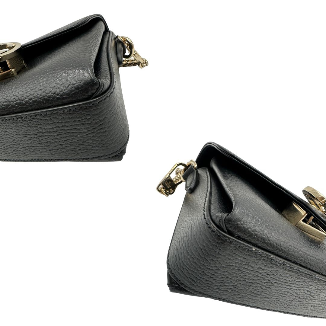 angoli Borsa Gucci Interlocking in pelle nera 