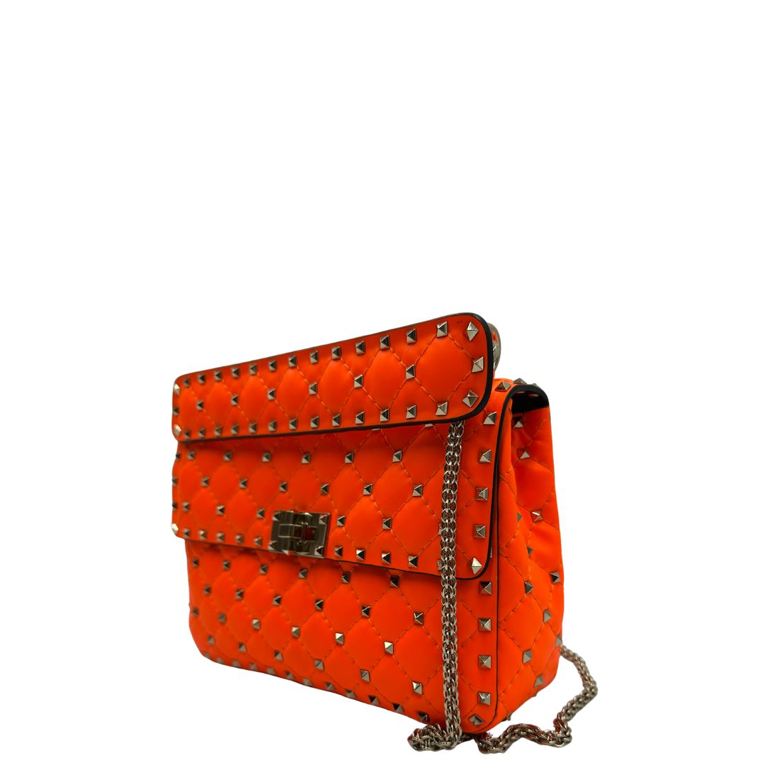 lato  Borsa V. G. in pelle arancione, di lusso, originale, ottime condizioni, usata 