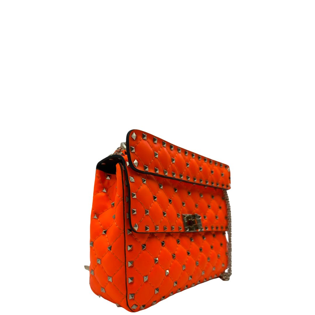 lato  Borsa V. G. in pelle arancione, di lusso, originale, ottime condizioni, usata 