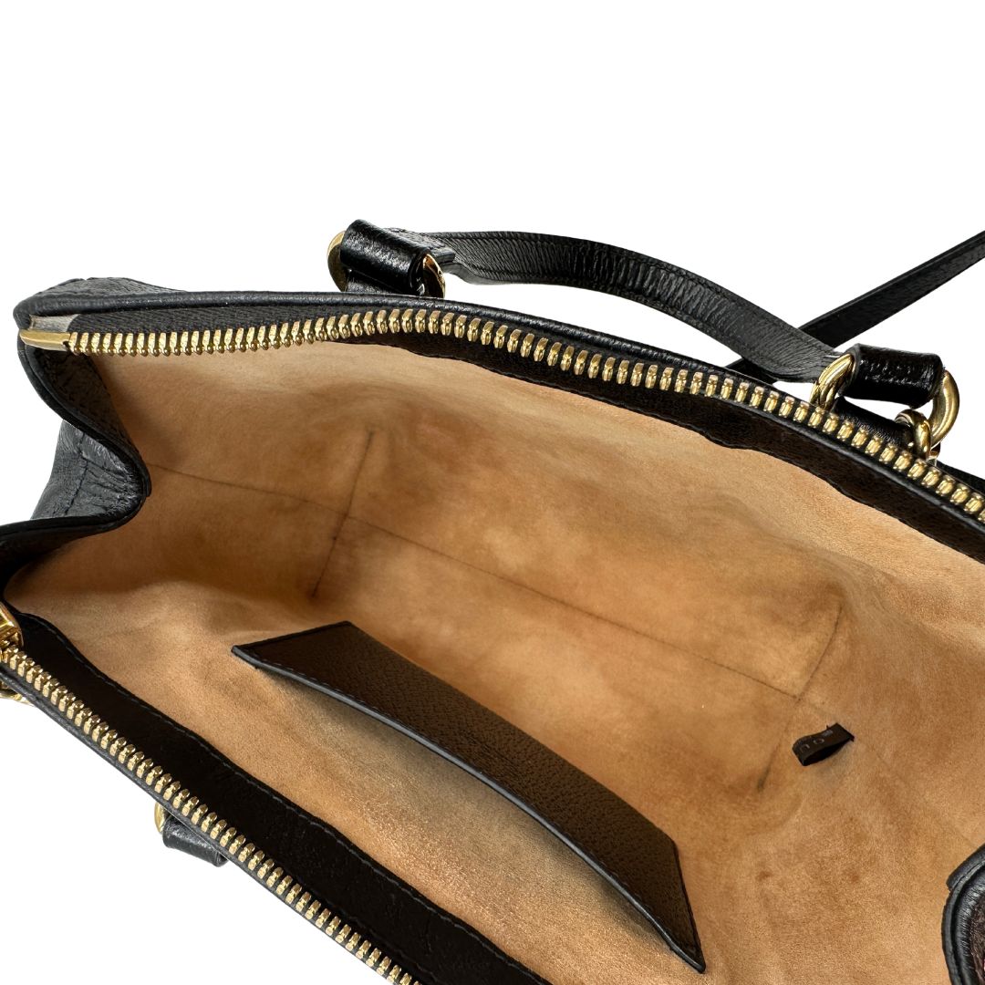 interno Borsa Gucci in pelle nera impreziosita da iconica striscia Web verde e rossa, di lusso, originale, ottime condizioni, usata 