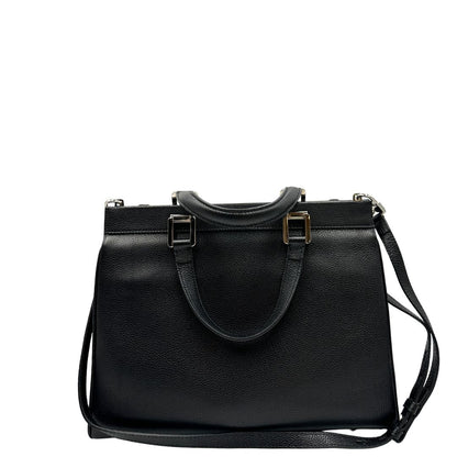 Retro, Borsa Gucci in pelle martellata nera caratterizzata dal dettaglio Horsebit in metallo dorato e argentato con doppie G sul front. Indossabile a mano oppure a spalla. Originale, usata, di lusso, in ottime condizioni.