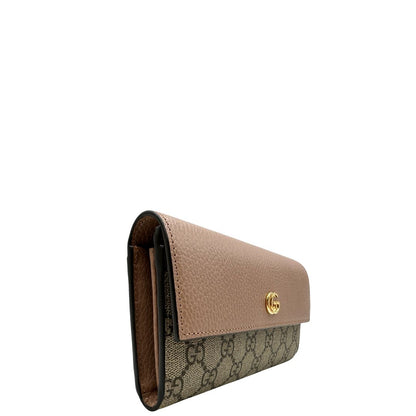 Portafoglio Gucci in canvas GG con fintiure in pelle rosa