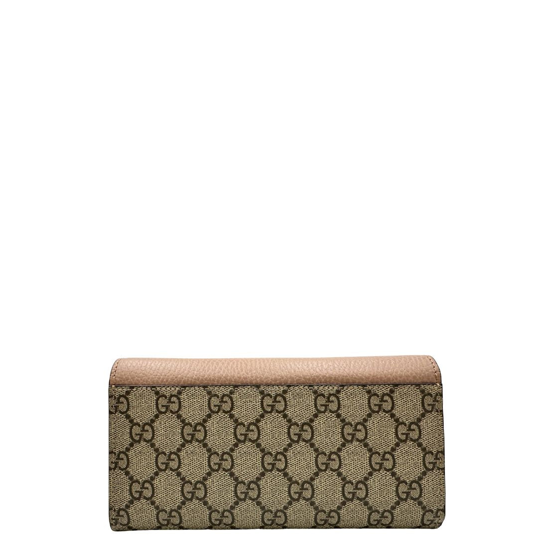 Portafoglio Gucci in canvas GG con fintiure in pelle rosa