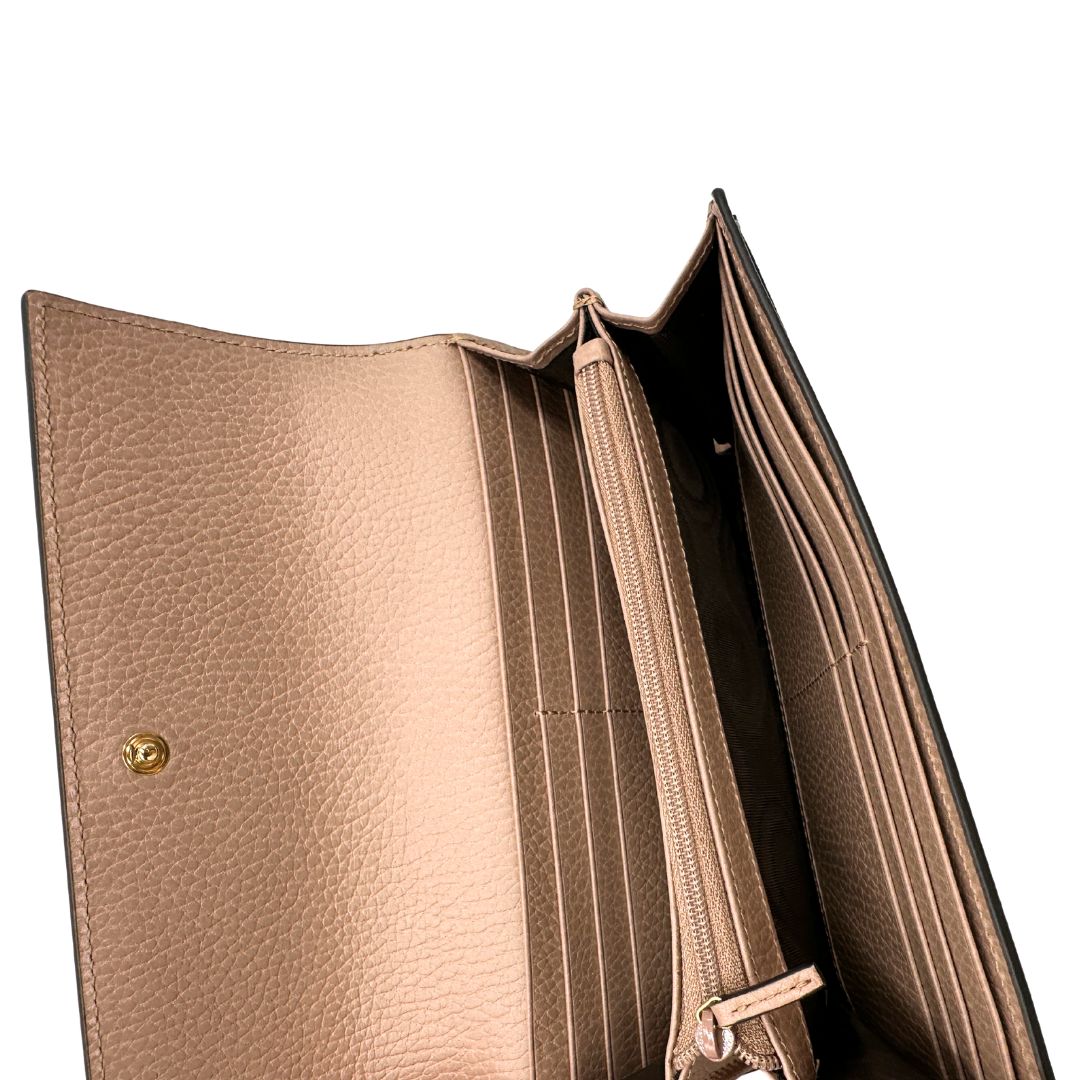 Portafoglio Gucci in canvas GG con fintiure in pelle rosa