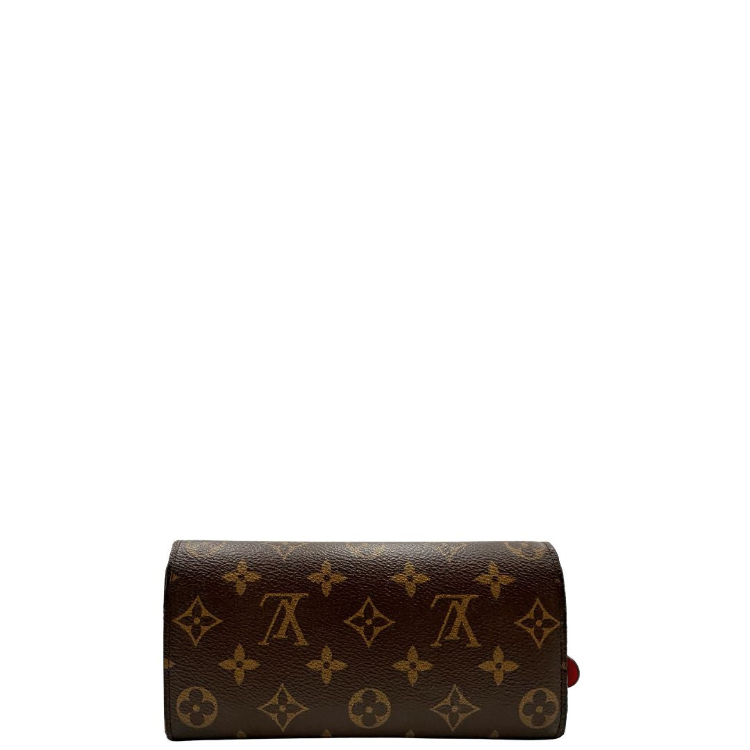 Retro, Portafoglio Louis Vuitton Emilie Bloom Flower realizzato in tela Monogram ed è impreziosito da un bottone a forma di fiore. Originale, usato, di lusso, in ottime condizioni.