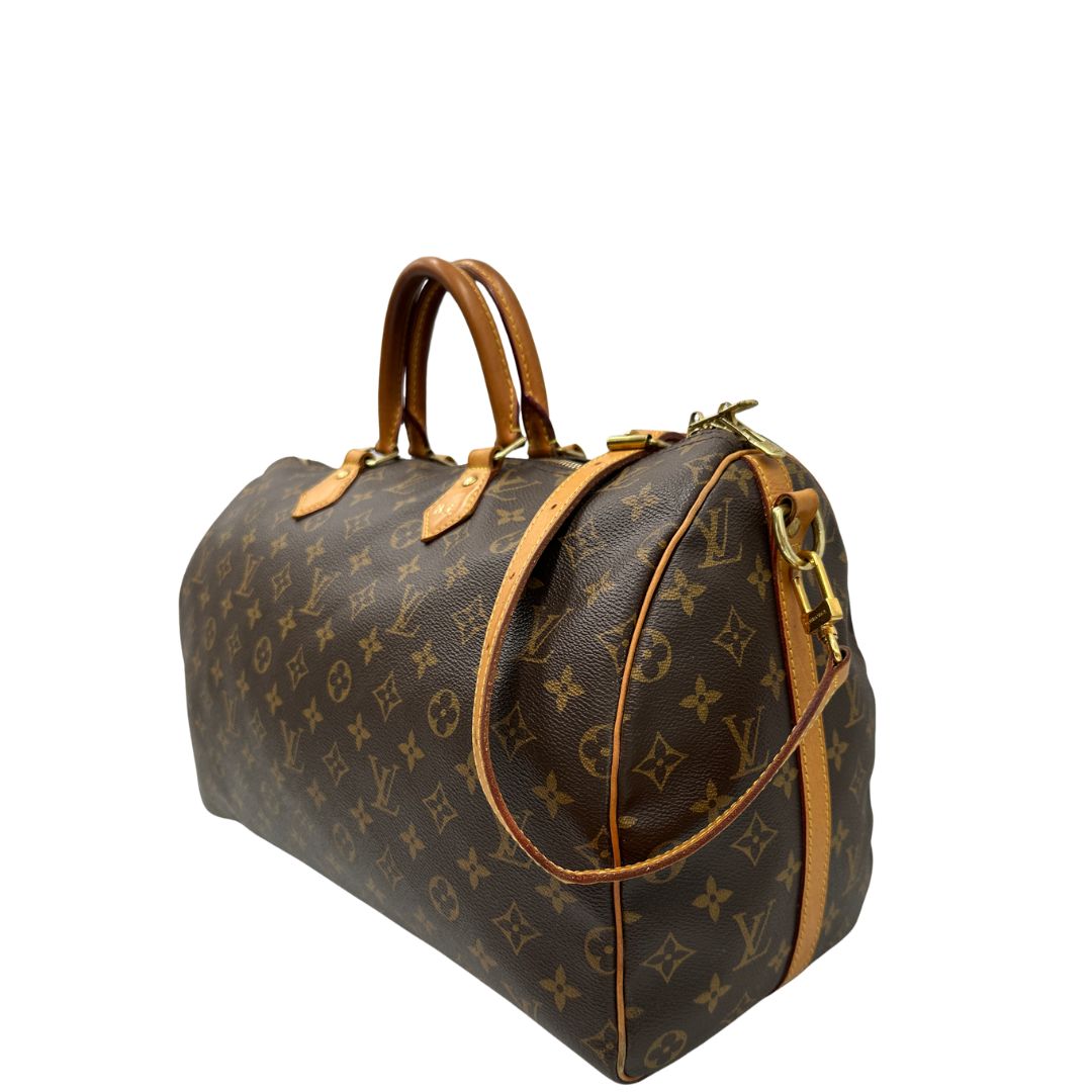 lato  Speedy Louis Vuitton in canvas marrone, di lusso, originale, ottime condizioni, usata 