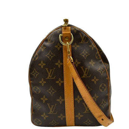 lato  Speedy Louis Vuitton in canvas marrone, di lusso, originale, ottime condizioni, usata 