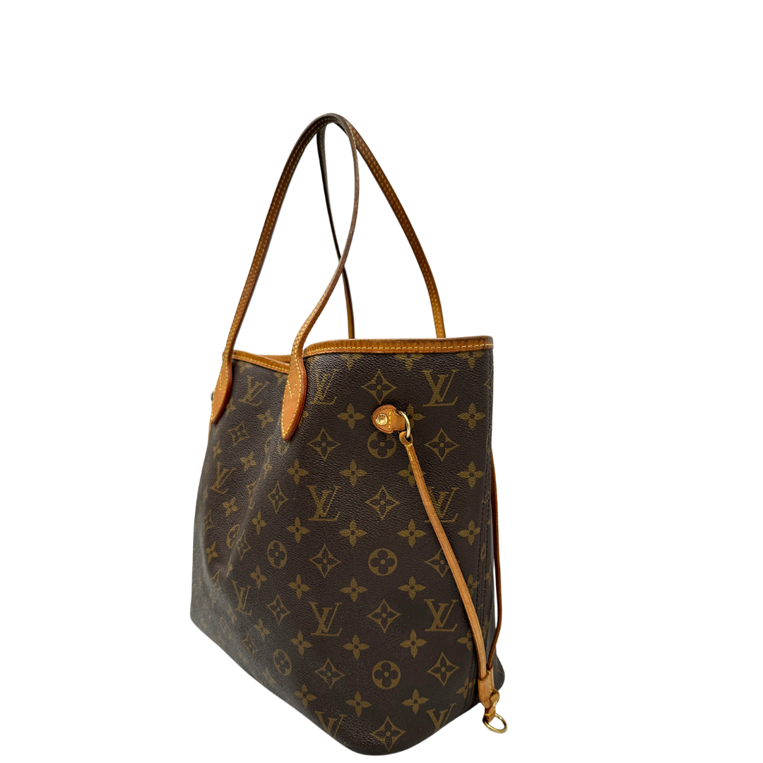 Lato, Louis Vuitton Neverfull nella versione MM in canvas monogram. Indossabile a spalla. Originale, usata, di lusso, in ottime condizioni.