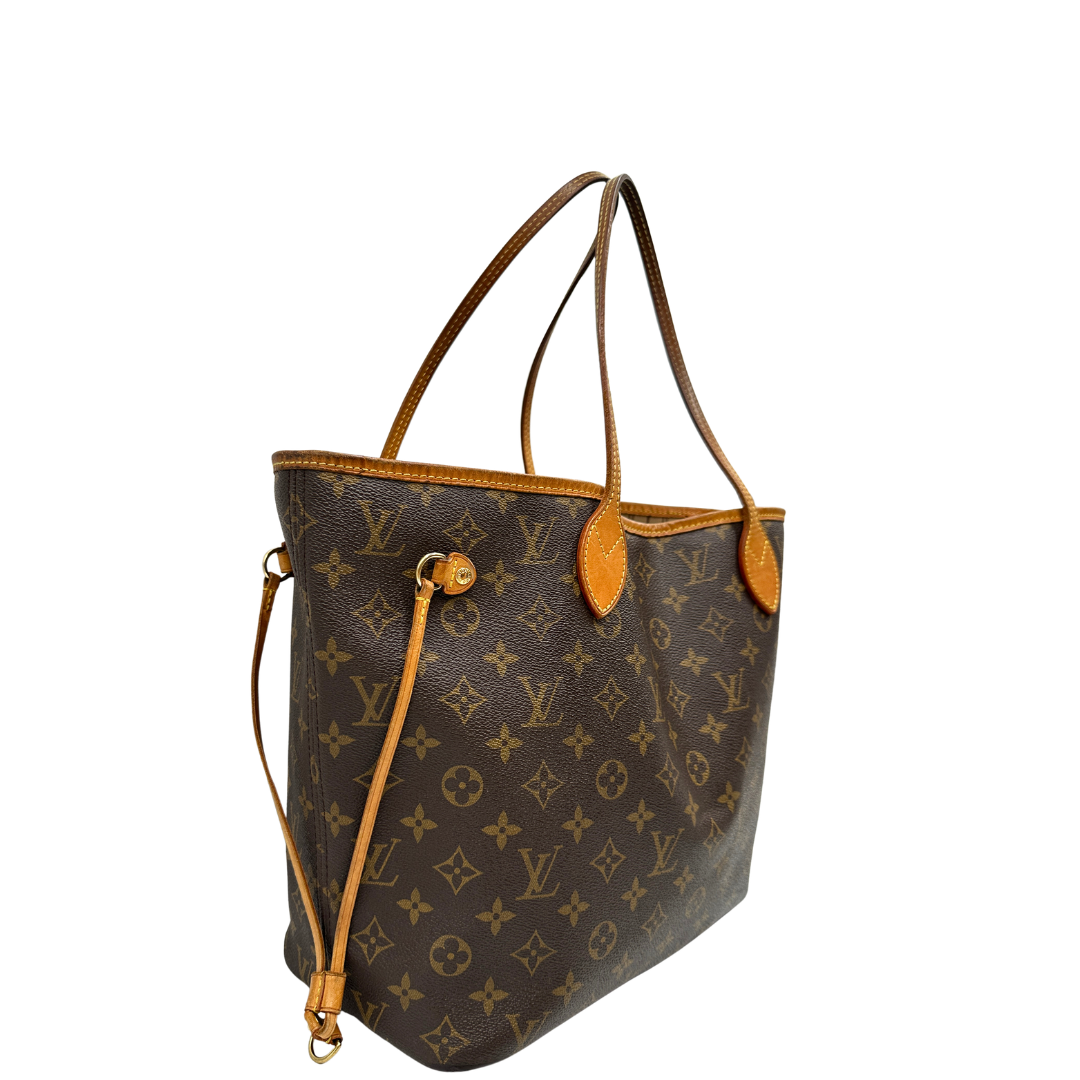 Lato, Louis Vuitton Neverfull nella versione MM in canvas monogram. Indossabile a spalla. Originale, usata, di lusso, in ottime condizioni.