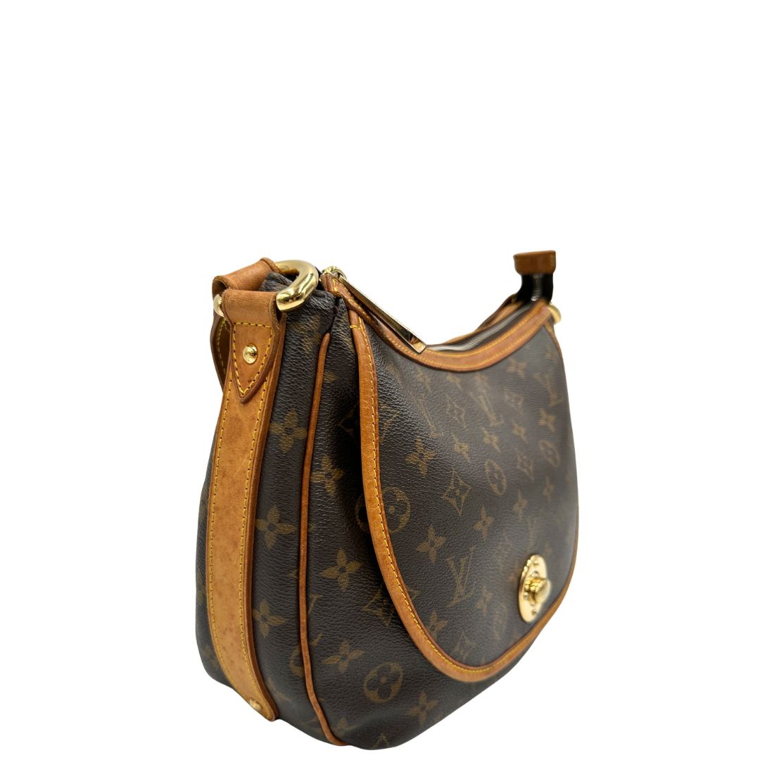 lato  Borsa LV in canvas marrone monogram con finiture in vacchetta naturale 