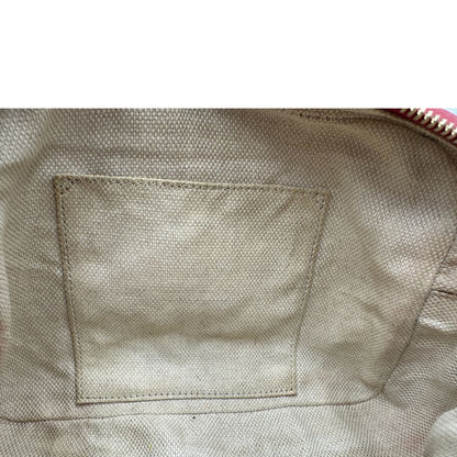 Interno, Borsa Gucci Soho in pelle martellata color, rosso con tracolla regolabile e nappa decorativa con frange. Originale, usata, di lusso, in ottime condizioni.