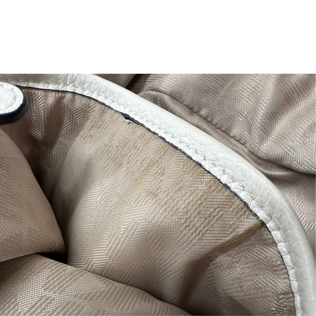 interno Zaino Michael Kors in pelle bianca e nera