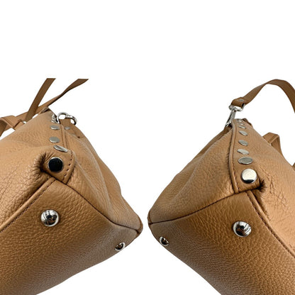 angoli Postina in pelle beige nella misura S 