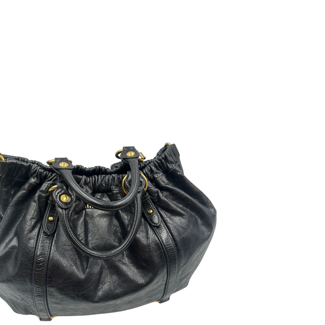 manici  Borsa Miu Miu realizzata in morbida pelle 