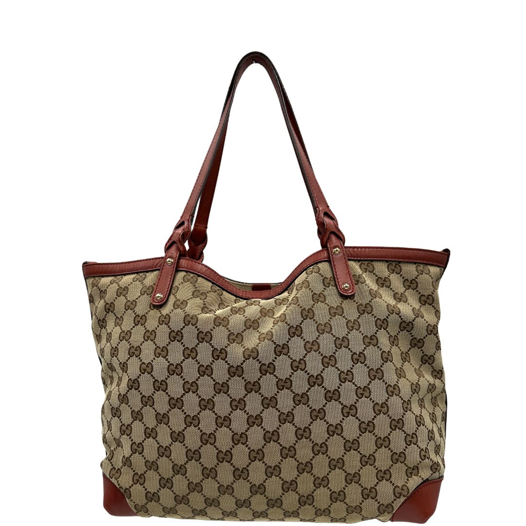 front Borsa Tote Gucci in tessuto GG con finiture in pelle color terracotta 