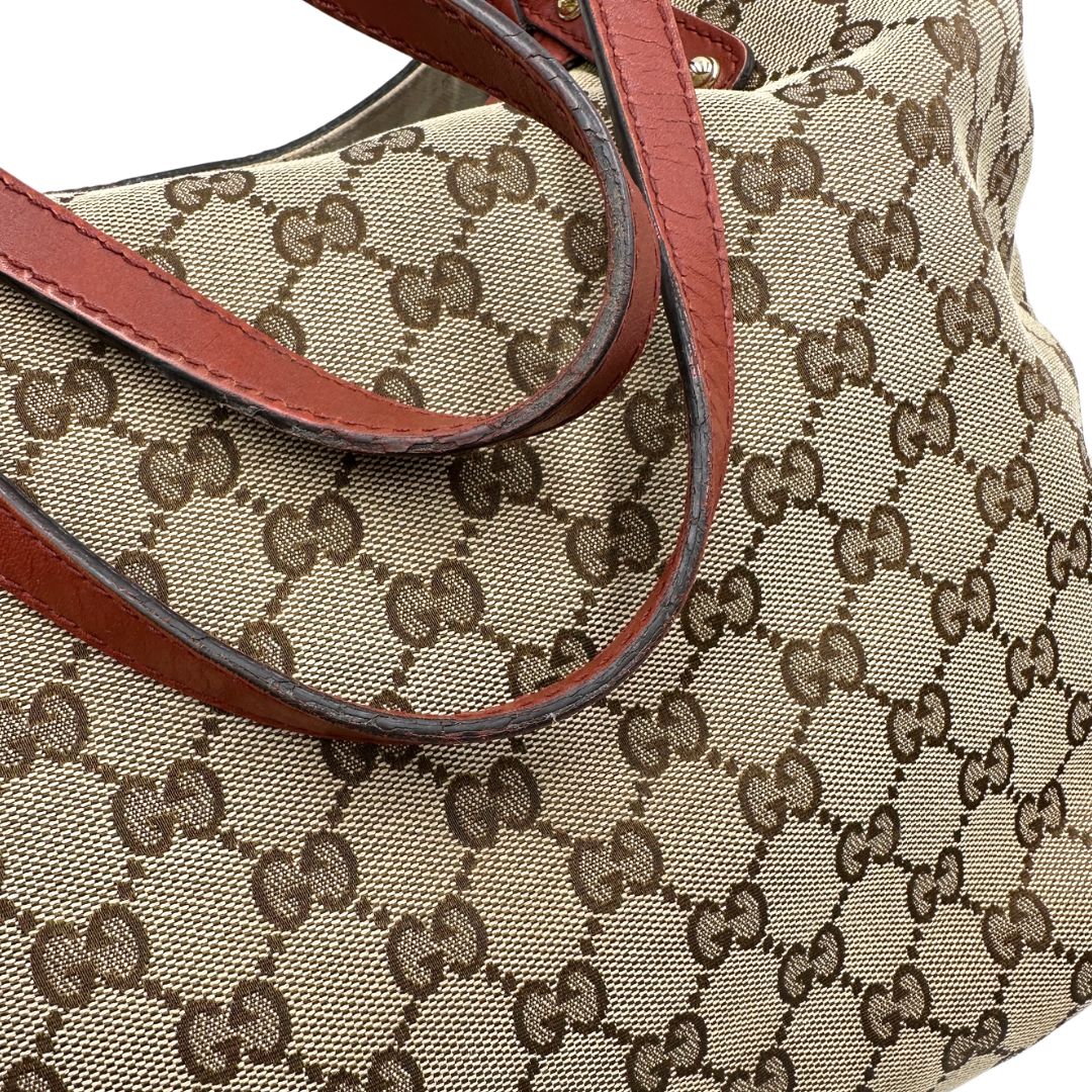 manici Borsa Tote Gucci in tessuto GG con finiture in pelle color terracotta 