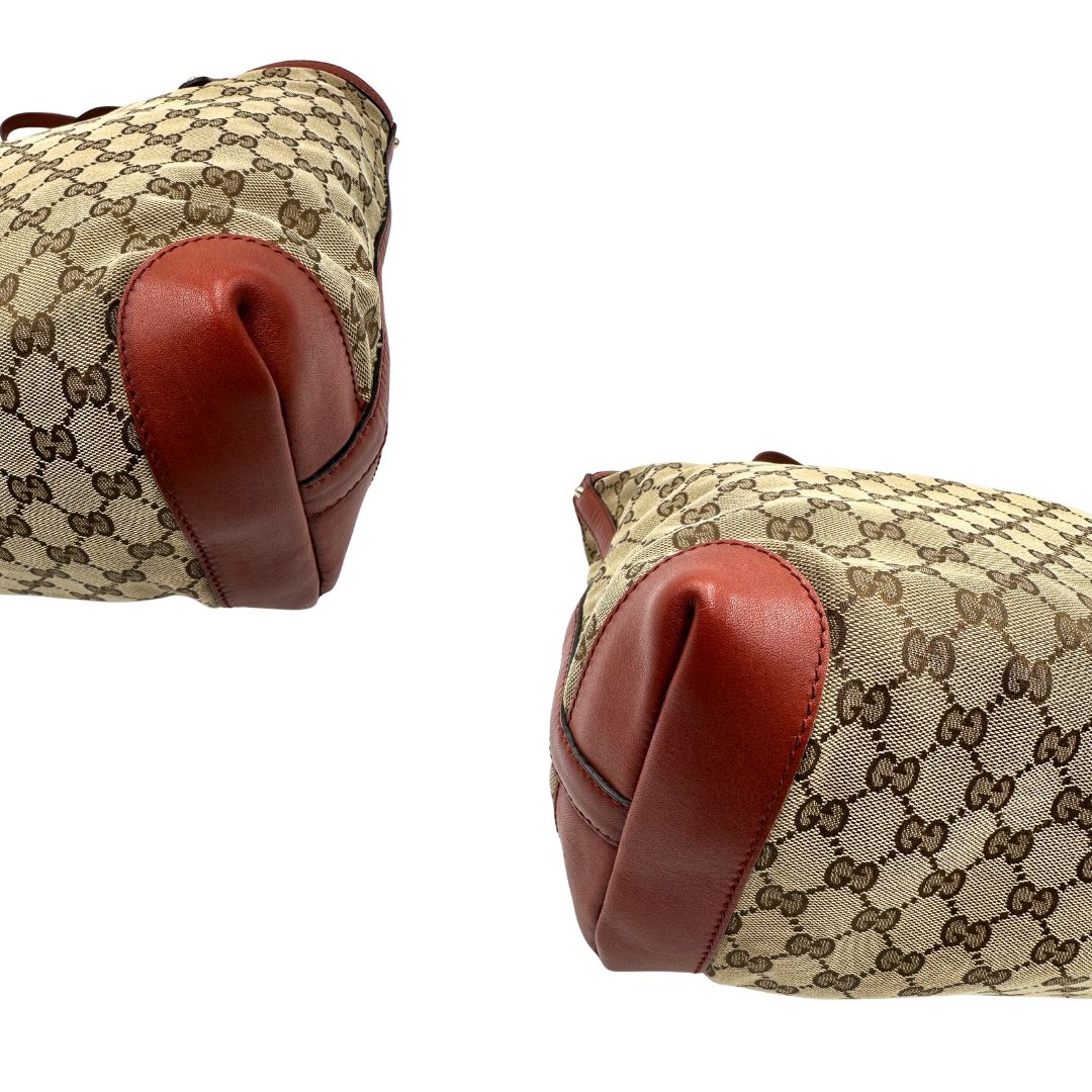 angoli Borsa Tote Gucci in tessuto GG con finiture in pelle color terracotta 