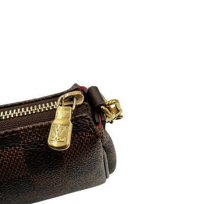Pochette Eva Damier Ébène Louis Vuitton