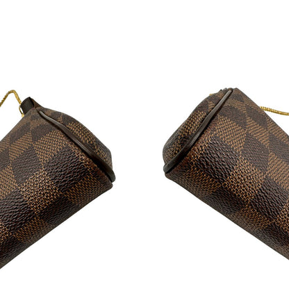 Pochette Eva Damier Ébène Louis Vuitton